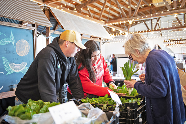 Local farmers sell fresh fruits and vegetables at the LMH Market
