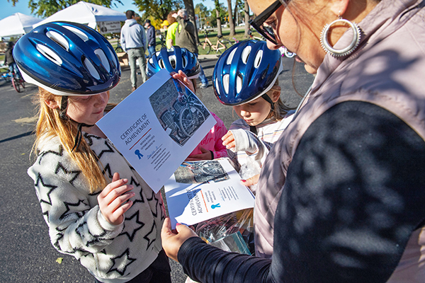 Community members complete bike safety event